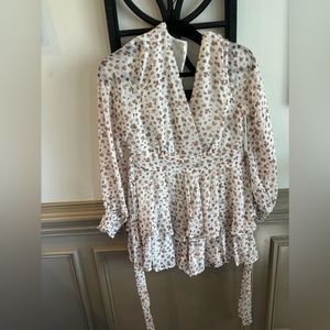 Size medium romper with a zipper in the back